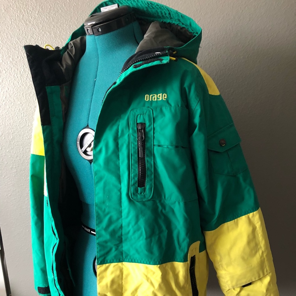 Orange TJ Schiller pro skier winter parka